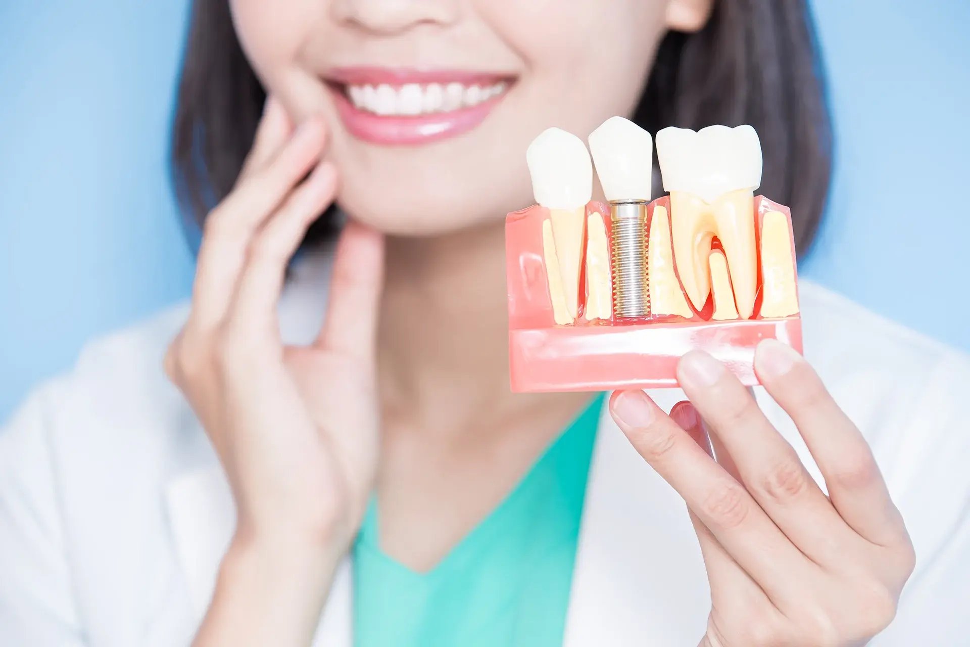 Restorra - About  - Say Goodbye to Dentures with Full-Arch Implant Specialists copy