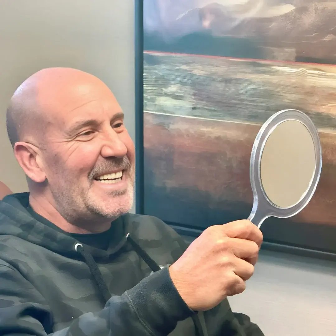man-checking-smile2